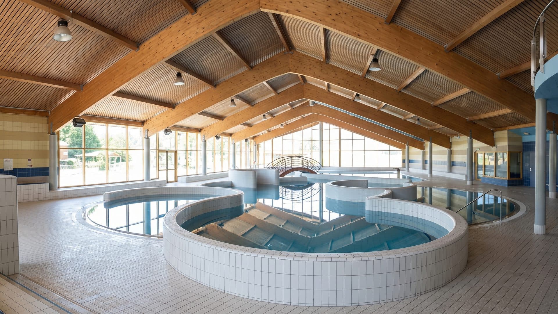 The pool hall of the Decin baths under its timber roof