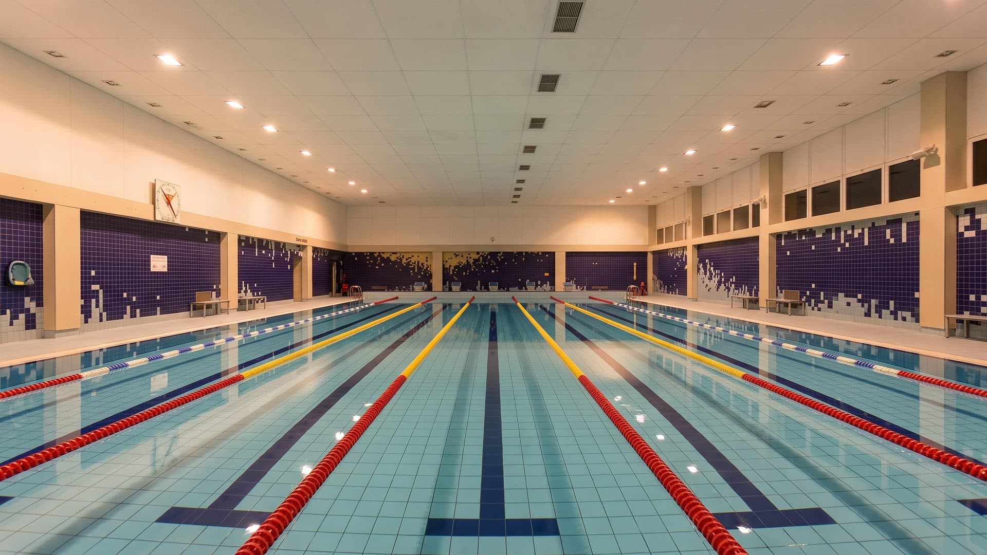 The lane pool of the Horovice water park seen down its length