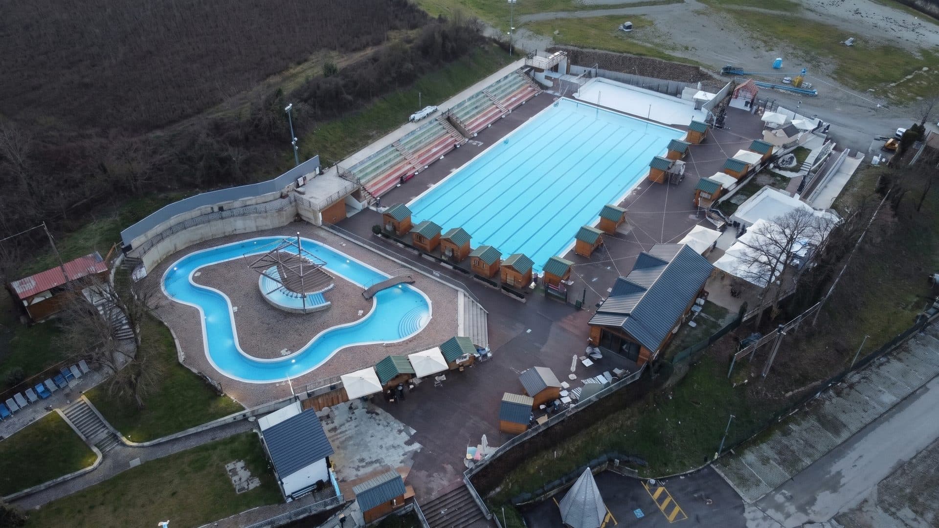The water park from the air with its pools and decks among the buildings