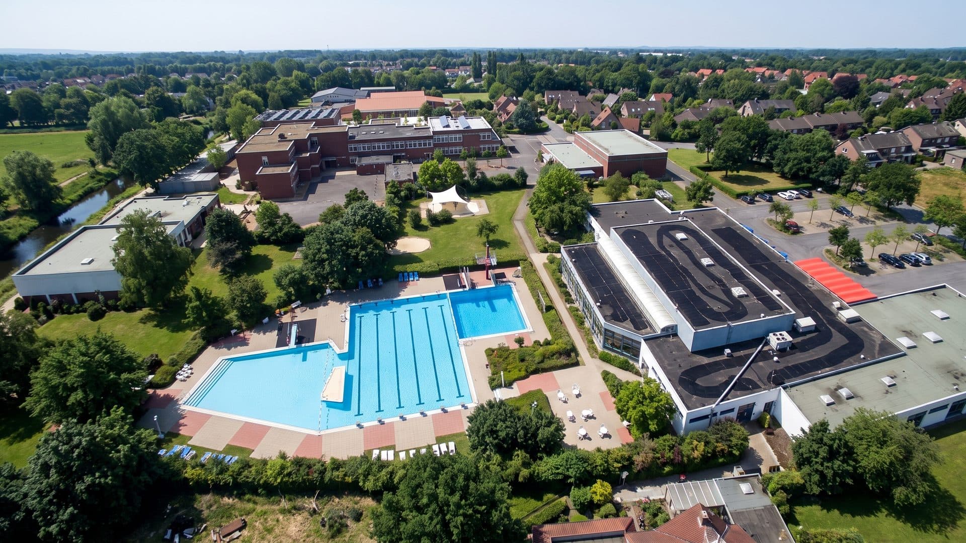 The Beverbad from the air with its pools and bath buildings among the lawns