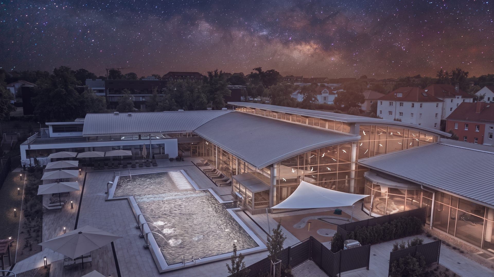 Aerial view of the bath at night beneath a starry sky
