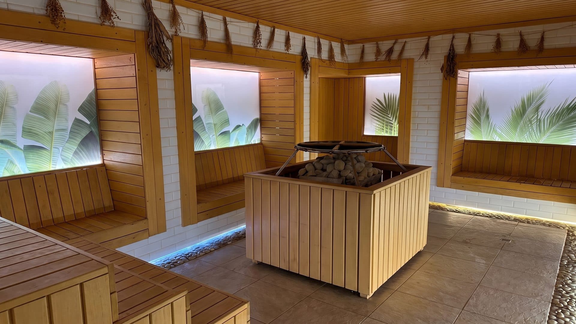 The sauna room of the Kaluga baths with its timber benches and the stove of hot stones