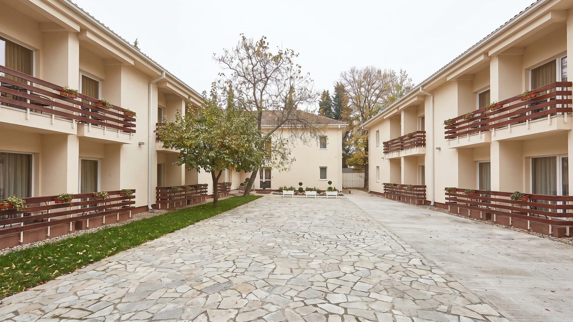 The courtyard of the Negorski Banji spa between its balconied wings