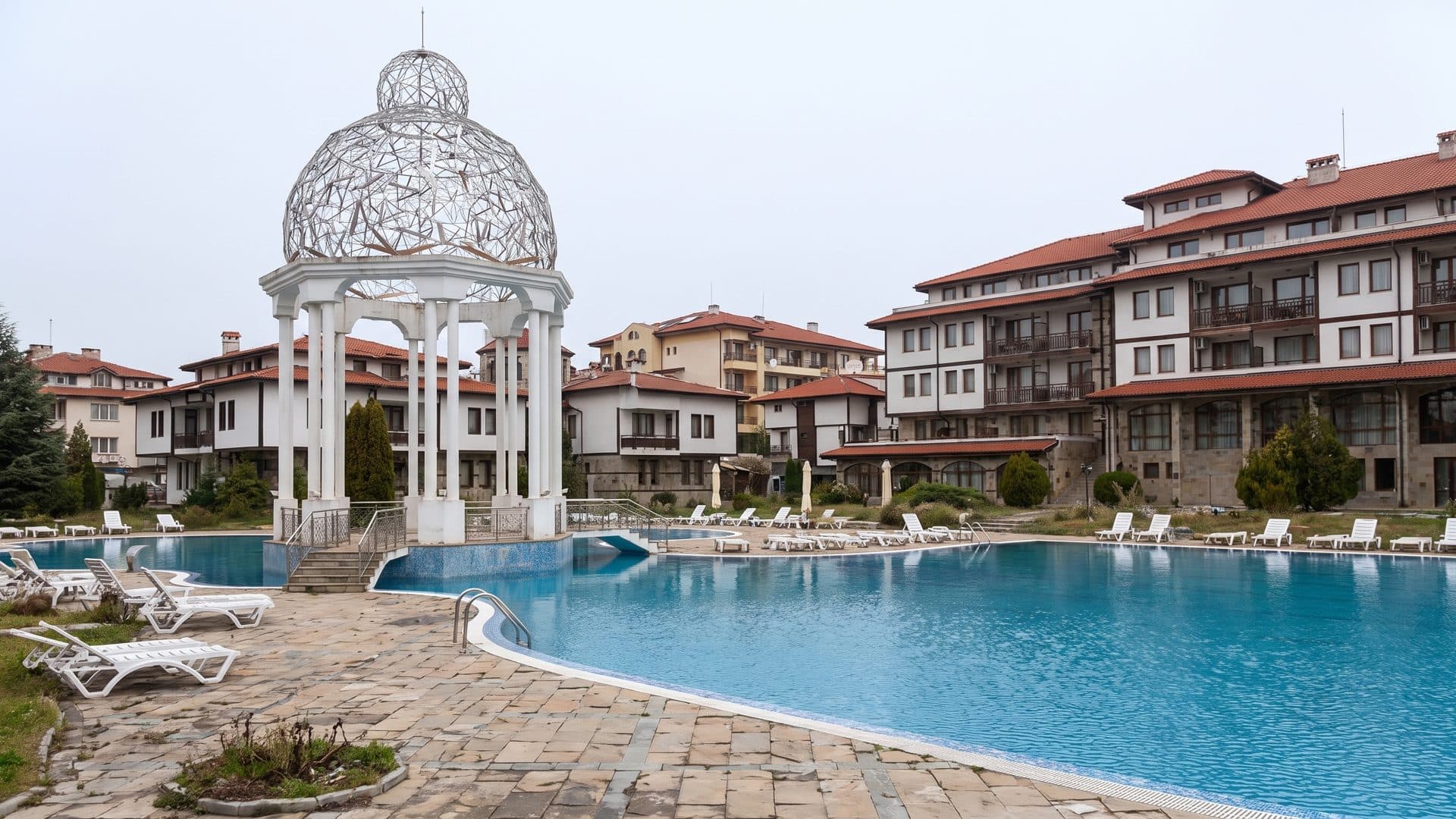 The outdoor thermal pool at Spa Struilitsa in Devin, with its white domed pavilion between the tile-roofed buildings