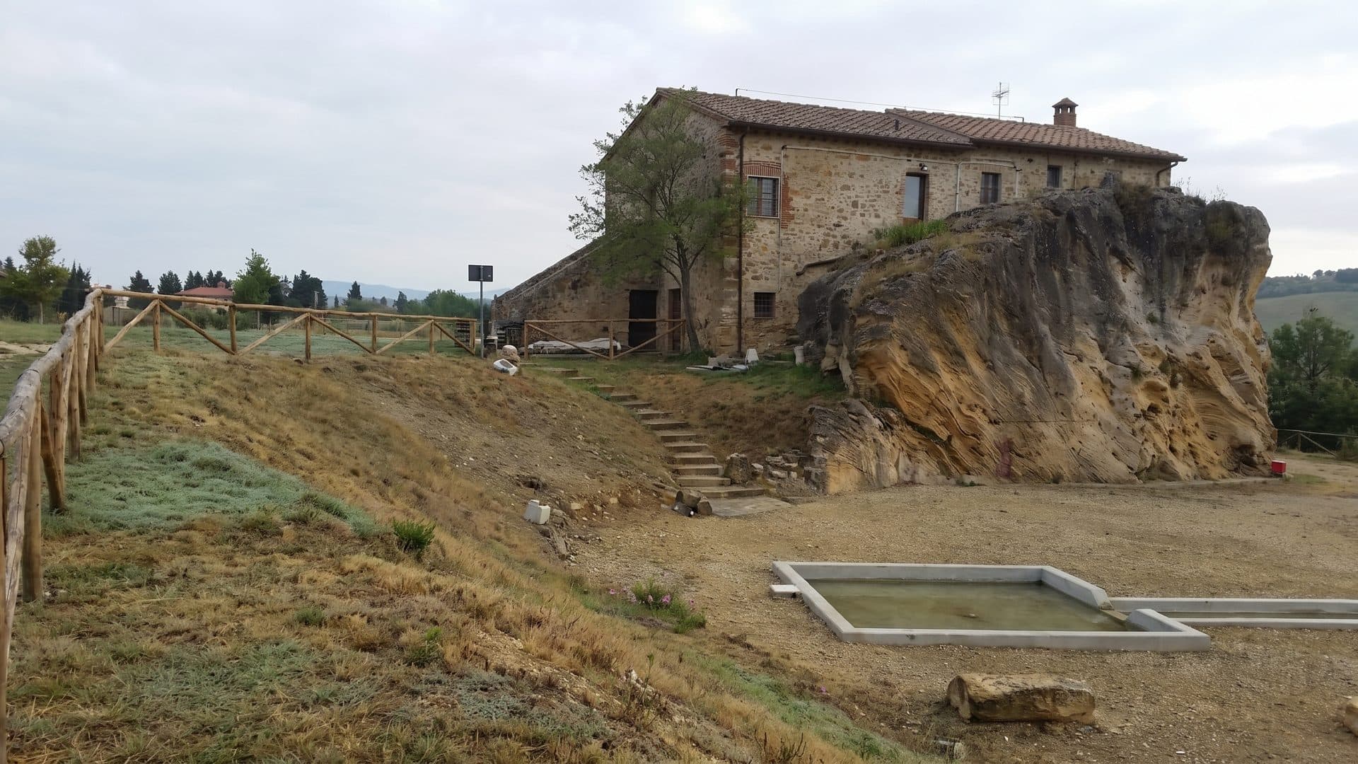 Acqua Borra: a stone building above the travertine rock where the free thermal spring surfaces near Castelnuovo Berardenga.