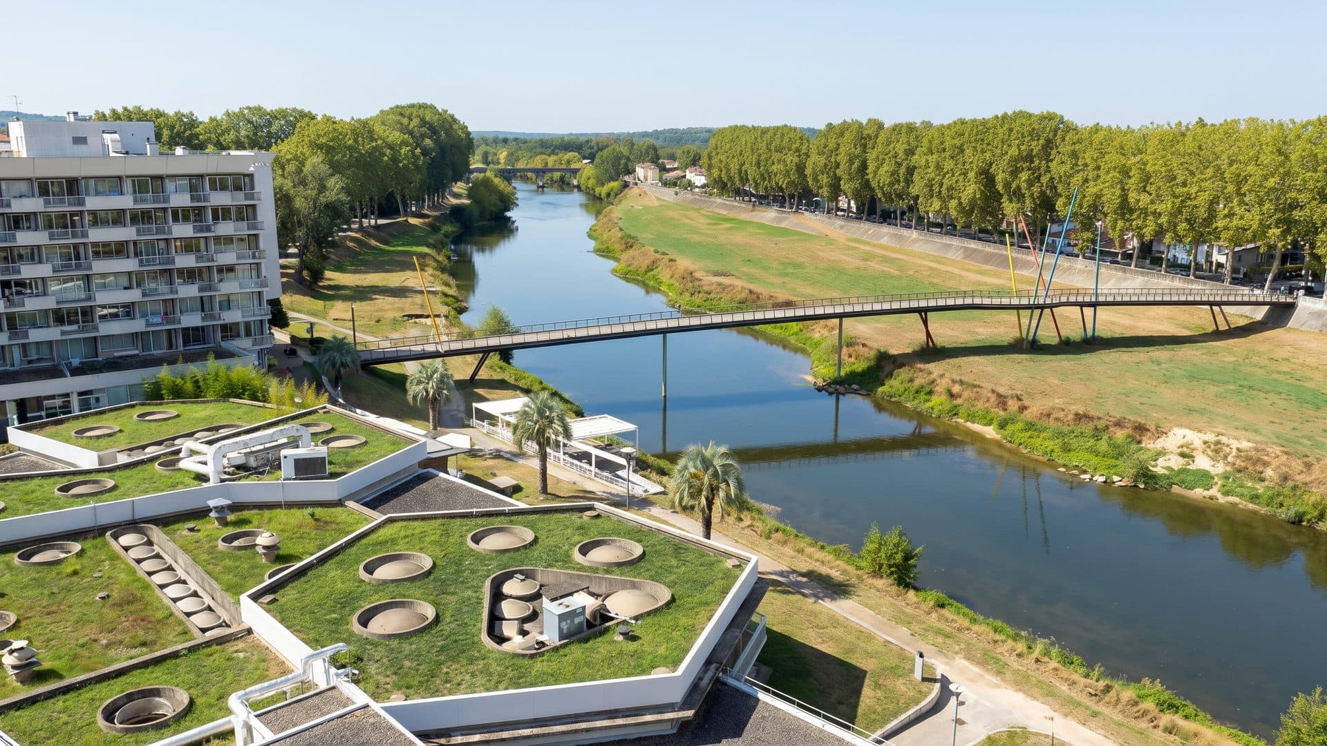 The Saint-Pierre thermal complex from the air beside its river and poplars